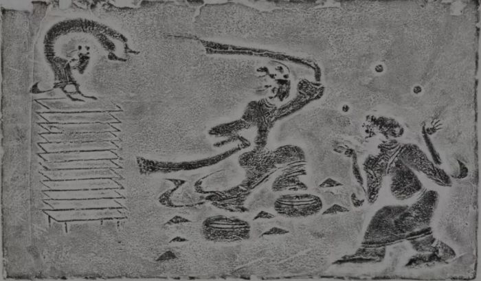 东汉杂技画像砖拓片,四川博物院藏.右下角的那个人正在"跳丸"